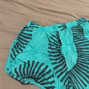 Manaola Turquoise and Black Shorts